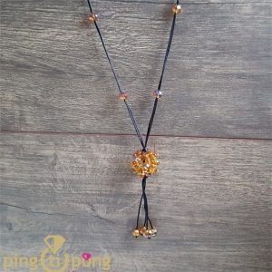 Sautoir perles jaunes à reflets